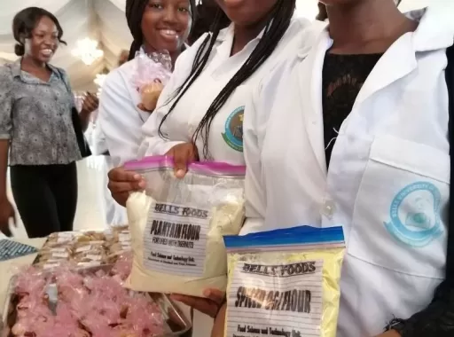 Students showcasing plantain and maize (Ogi) produced.
